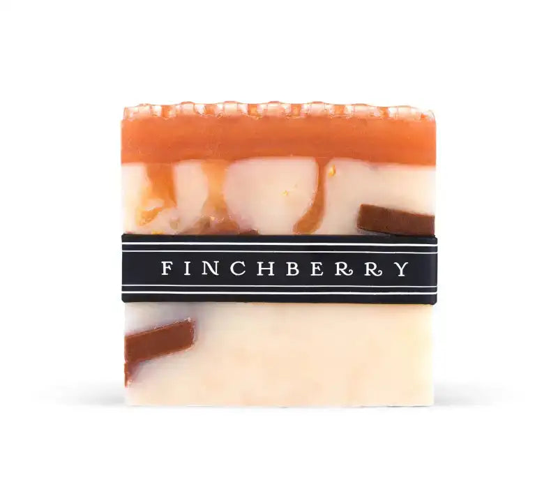 Marbled soap bar with a black 'Finchberry' label on a white background
