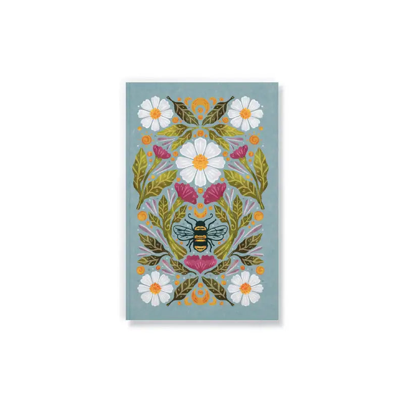 Decorative card with floral and bee design on a light blue background