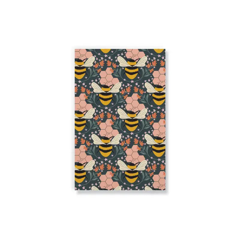 Notebook with bee and floral pattern on a white background