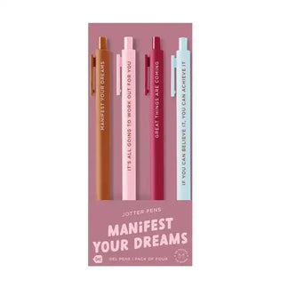 Set of four pens in different colors with motivational phrases on a pink background