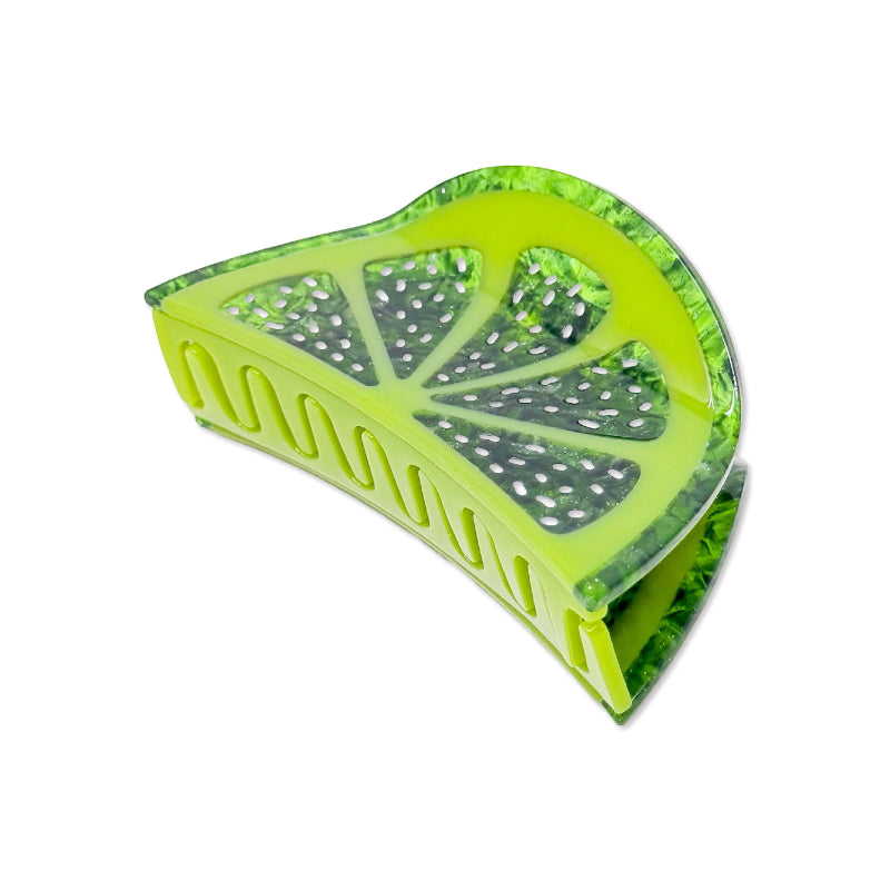 Large green lime hair claw clip on a white background