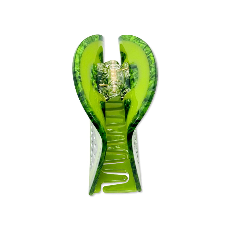 Large green lime hair claw clip on a white background