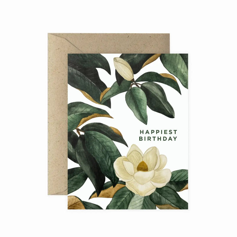 A floral greeting card with 'Happiest Birthday' text, accompanied by a brown envelope.