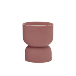 Pink ceramic planter on a white background