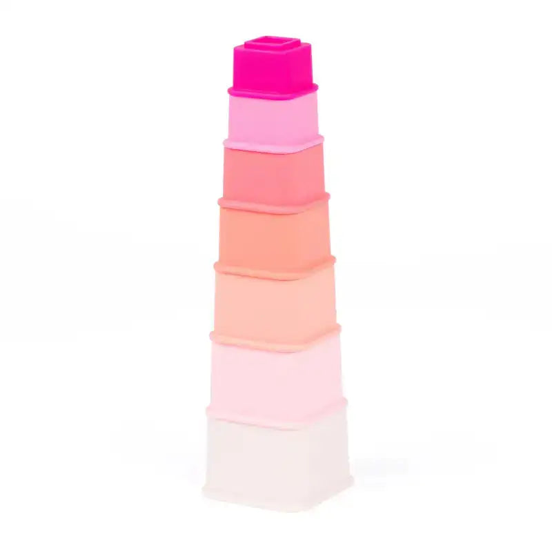 Stack of colorful cylindrical objects on a white background
