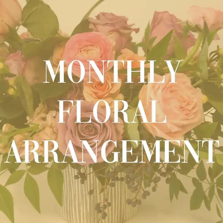 Floral arrangement with text overlay 'MONTHLY FLORAL ARRANGEMENT' on a beige background