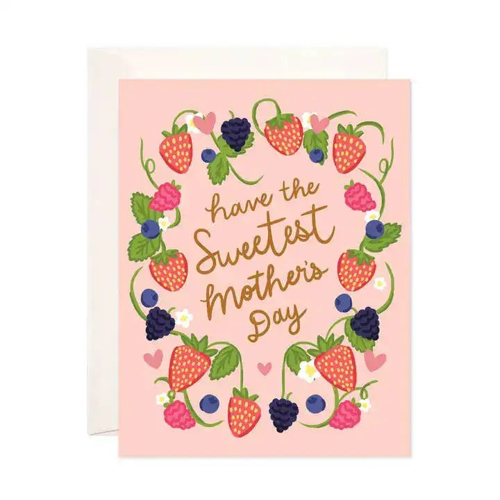Greeting card with strawberry and berry design on a pink background
