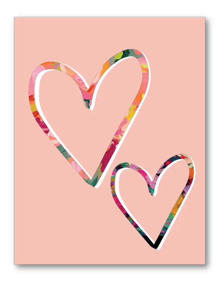 Two colorful heart shapes on a pink background