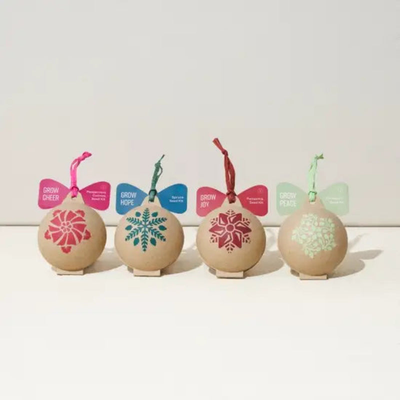Set of decorative eggs with floral and snowflake designs and colorful tags on a white background