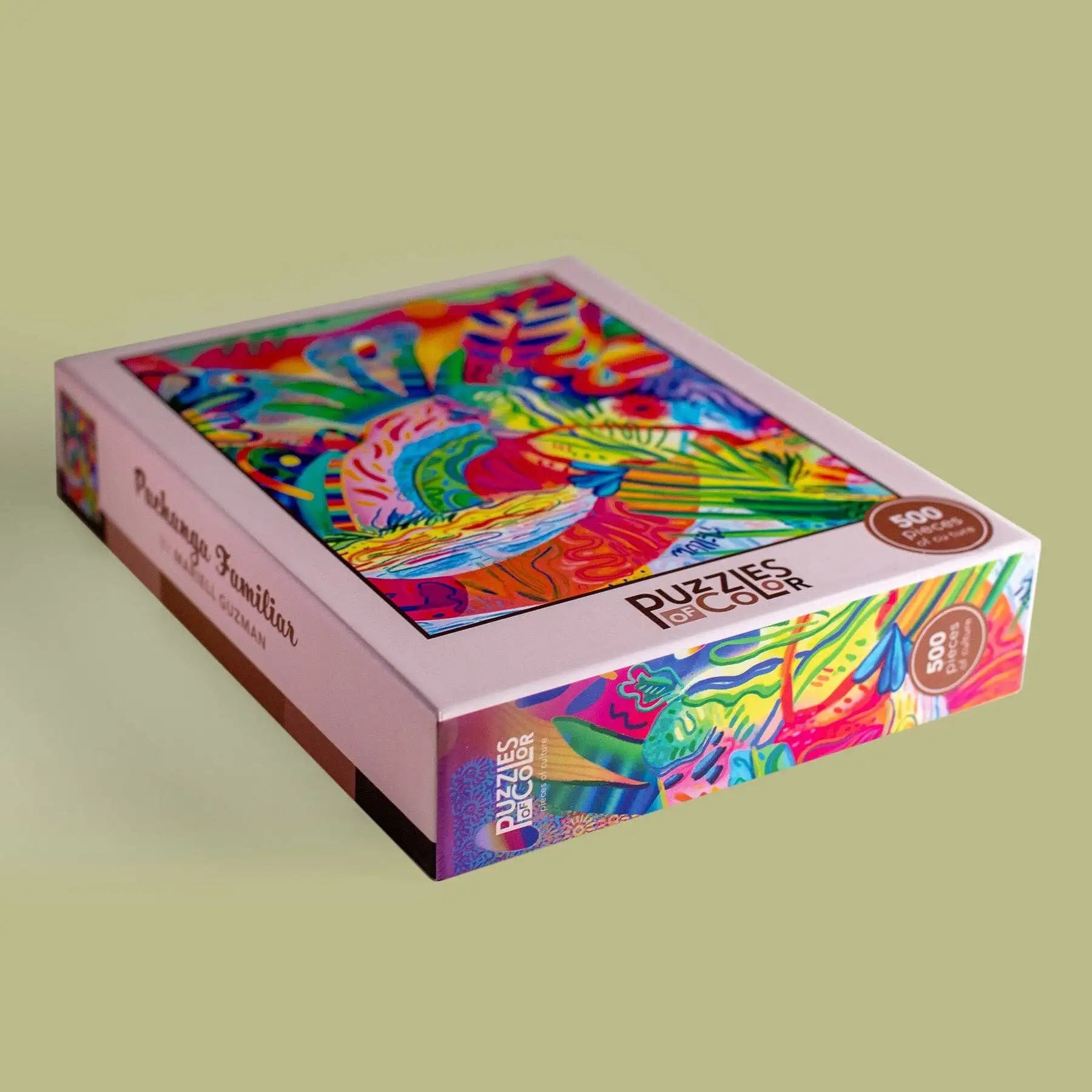 Colorful puzzle box with abstract design on a light green background