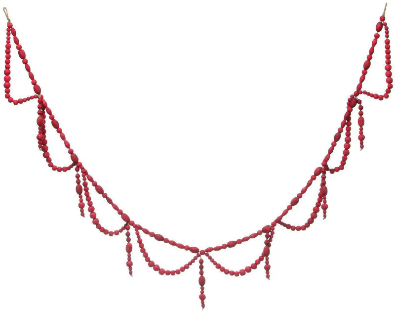 Red beaded necklace on a white background