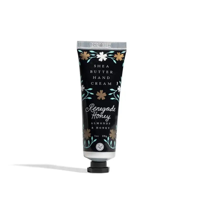 Shea butter hand cream tube with floral design on a white background