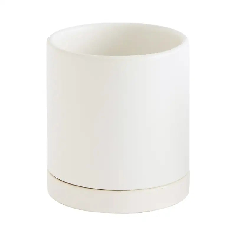 White ceramic planter on a white background