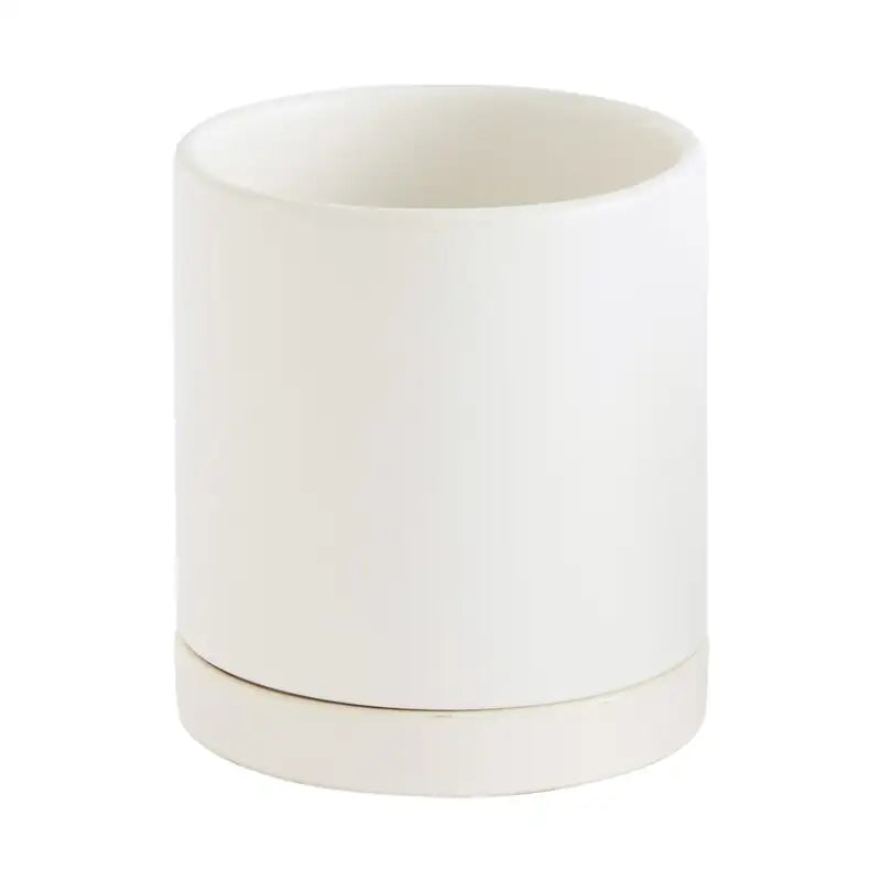 White ceramic planter on a white background