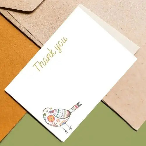 Greeting card with a bird illustration and 'Thank you' text on a colorful background