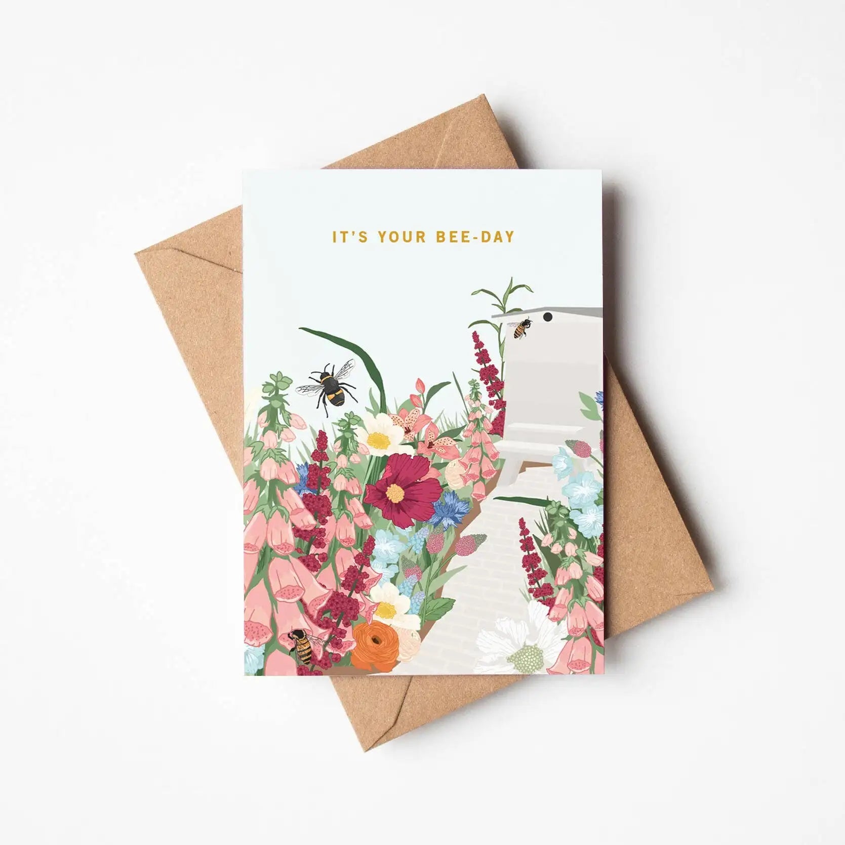Greeting card with floral design and envelope on a white background