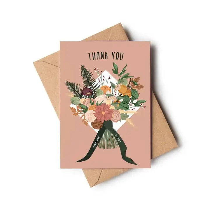 Greeting card with floral design and 'Thank You' text, accompanied by a brown envelope on a white background.