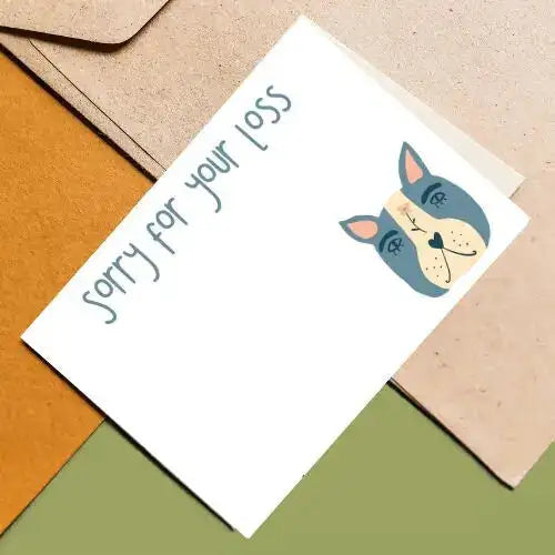 Card with a cat illustration and 'Sorry for your loss' text on a textured surface.