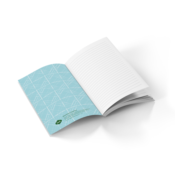 open journal with lined paper and blue printed inside cover