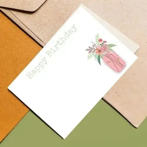 Birthday card with floral design on a colorful geometric background