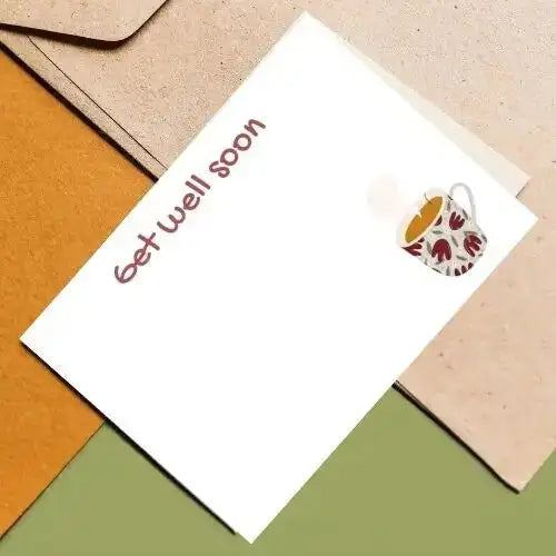 Greeting card with 'get well soon' text and a cup illustration on a colorful geometric background