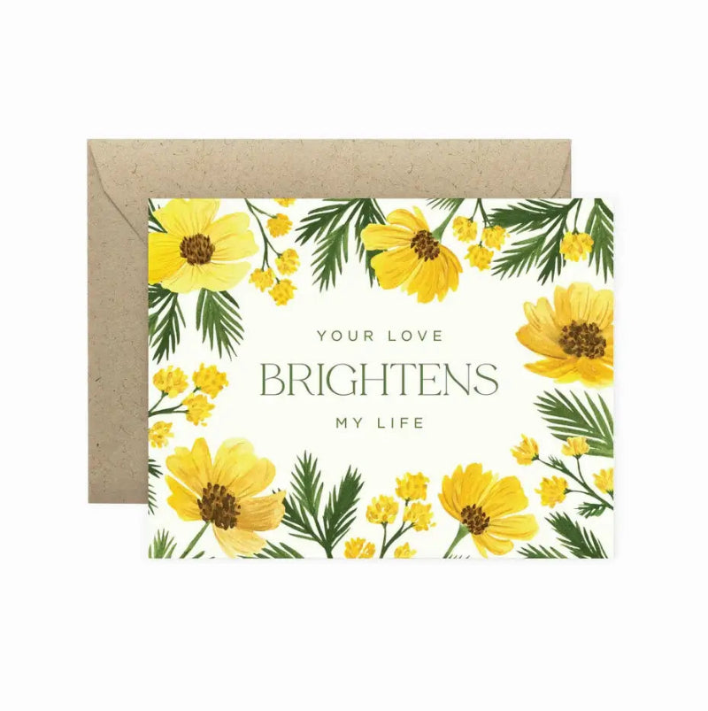 Floral card with yellow flowers and green leaves, featuring the text 'Your love brightens my life', with a brown envelope.