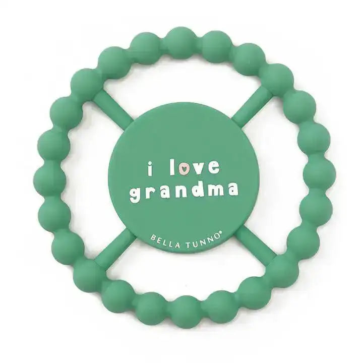 Teal teething ring with 'i love grandma' text on a white background