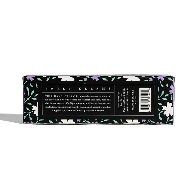 Hand cream packaging with floral design and text on a white background
