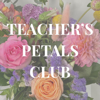 Teacher's Petals Club monthly flower subscription featuring a fresh seasonal floral arrangement delivered to a teacher's classroom in Richardson, TX by Lizzie Bee's Flower Shoppe.