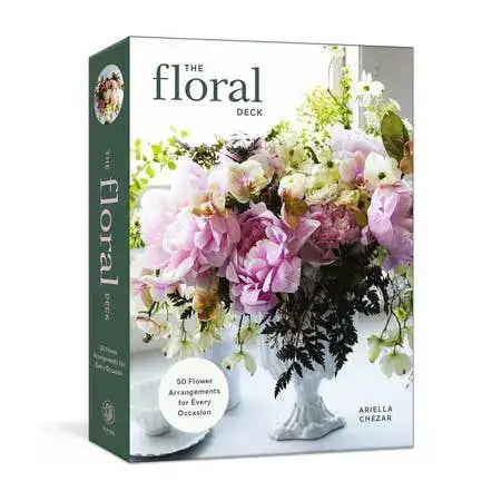 Floral-themed book or card deck packaging with flowers and a vase on a white background