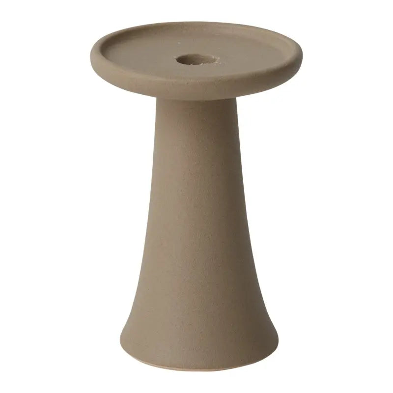 Beige ceramic pedestal on a white background