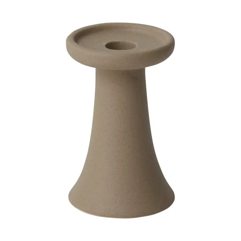Beige ceramic candle holder on a white background
