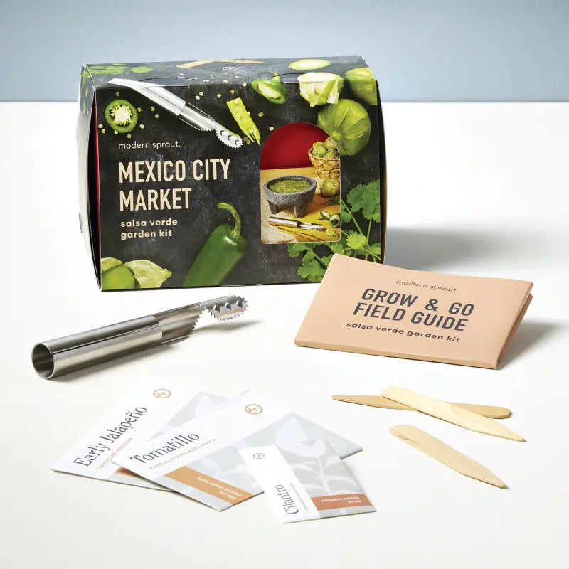Modern Sprout Mexico City Market salsa verde garden kit with packaging, tongs, and field guide on a white surface.