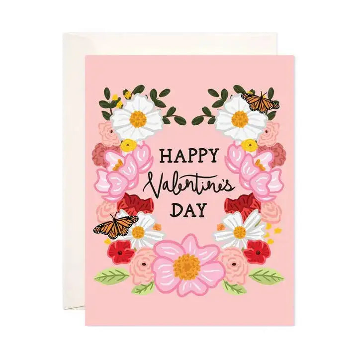 Valentine's Day card with flowers and butterflies on a pink background