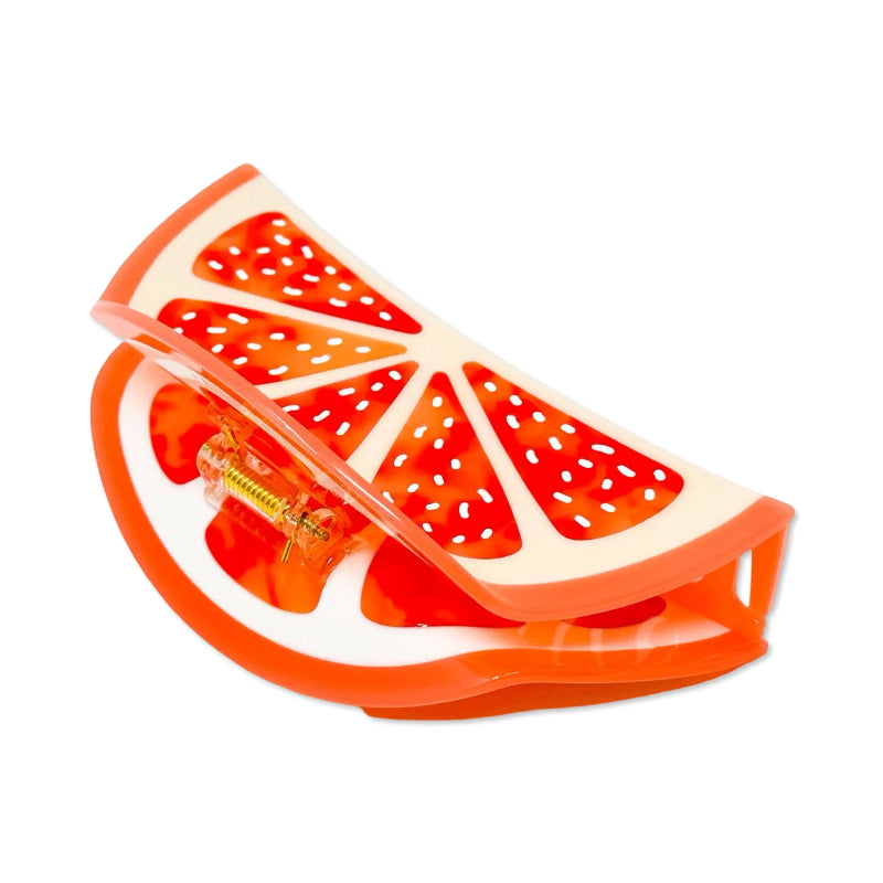 Grapefruit-shaped plastic bag on a white background